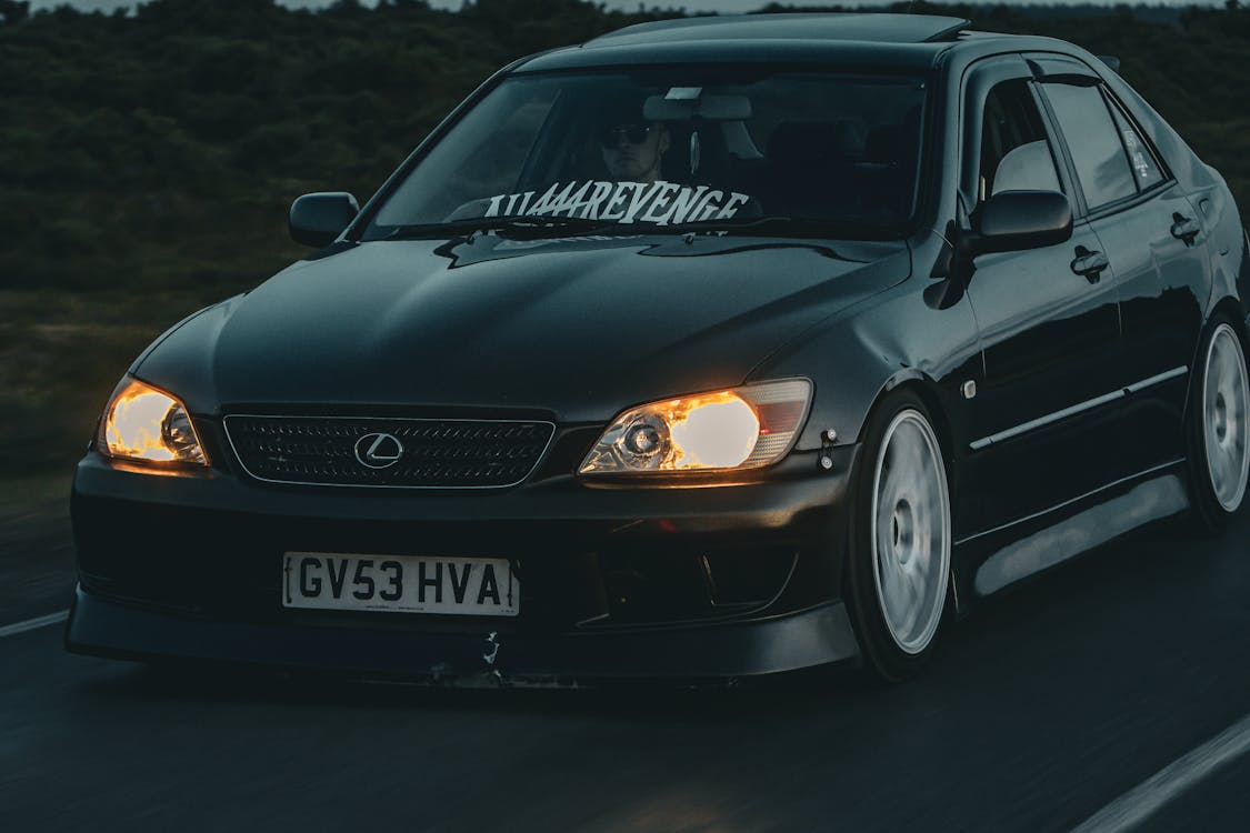 A Modified Black Lexus IS200 on the Street · Free Stock Photo