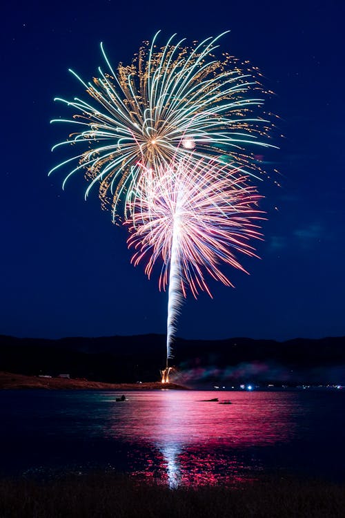 View of Fireworks above a Body of Water 