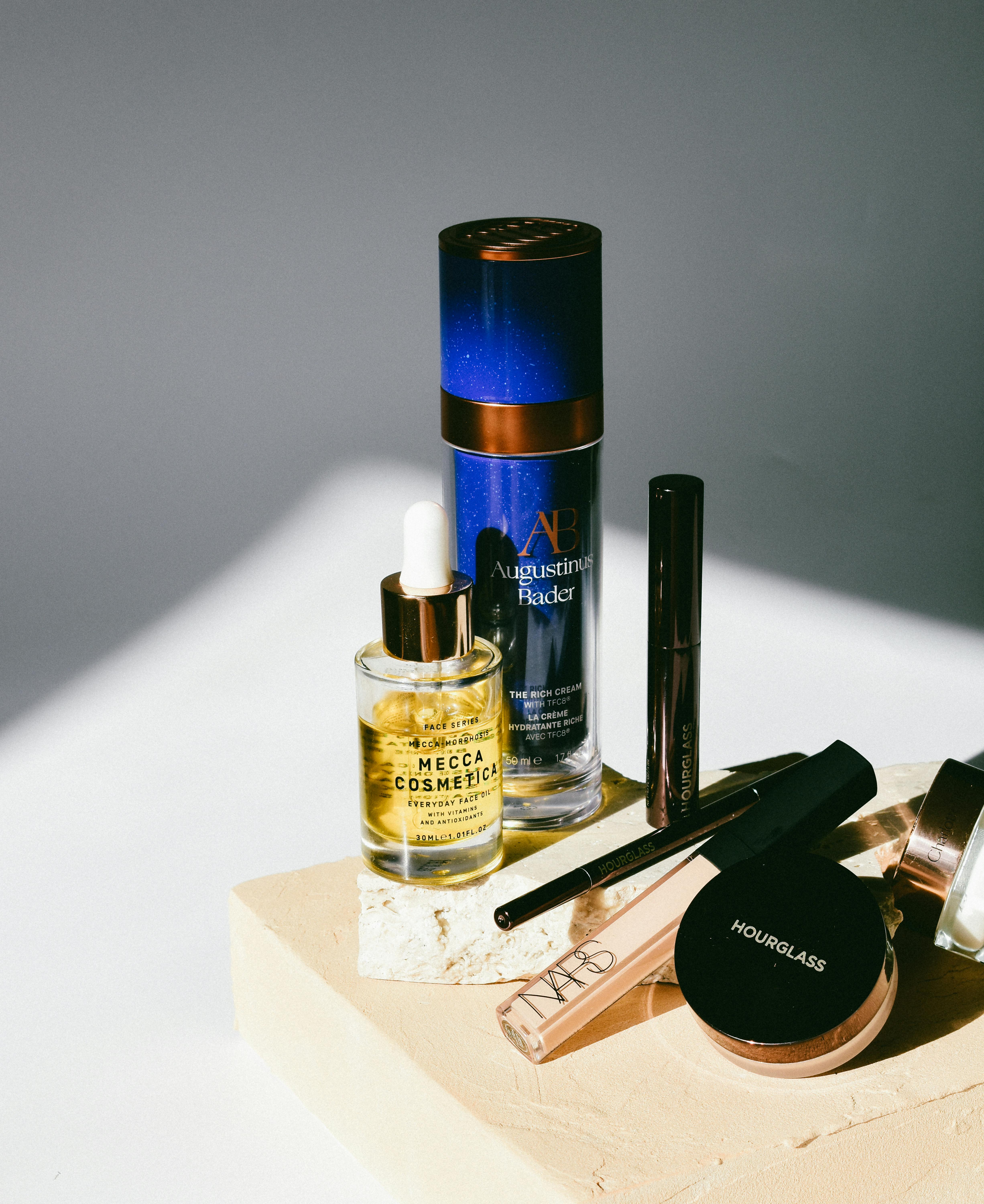 Close-up of luxury skincare cosmetics in natural sunlight. Perfect for premium beauty brand showcase.