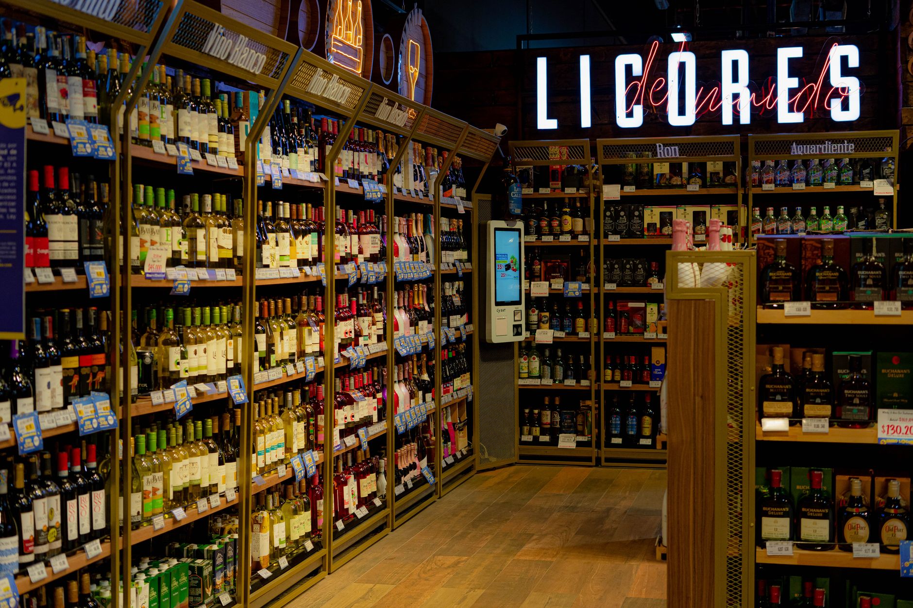 Explore a diverse selection of wines and spirits in this well-stocked liquor aisle.