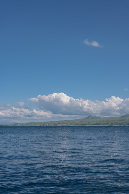 Lake Sea under White Clouds in the Sky 