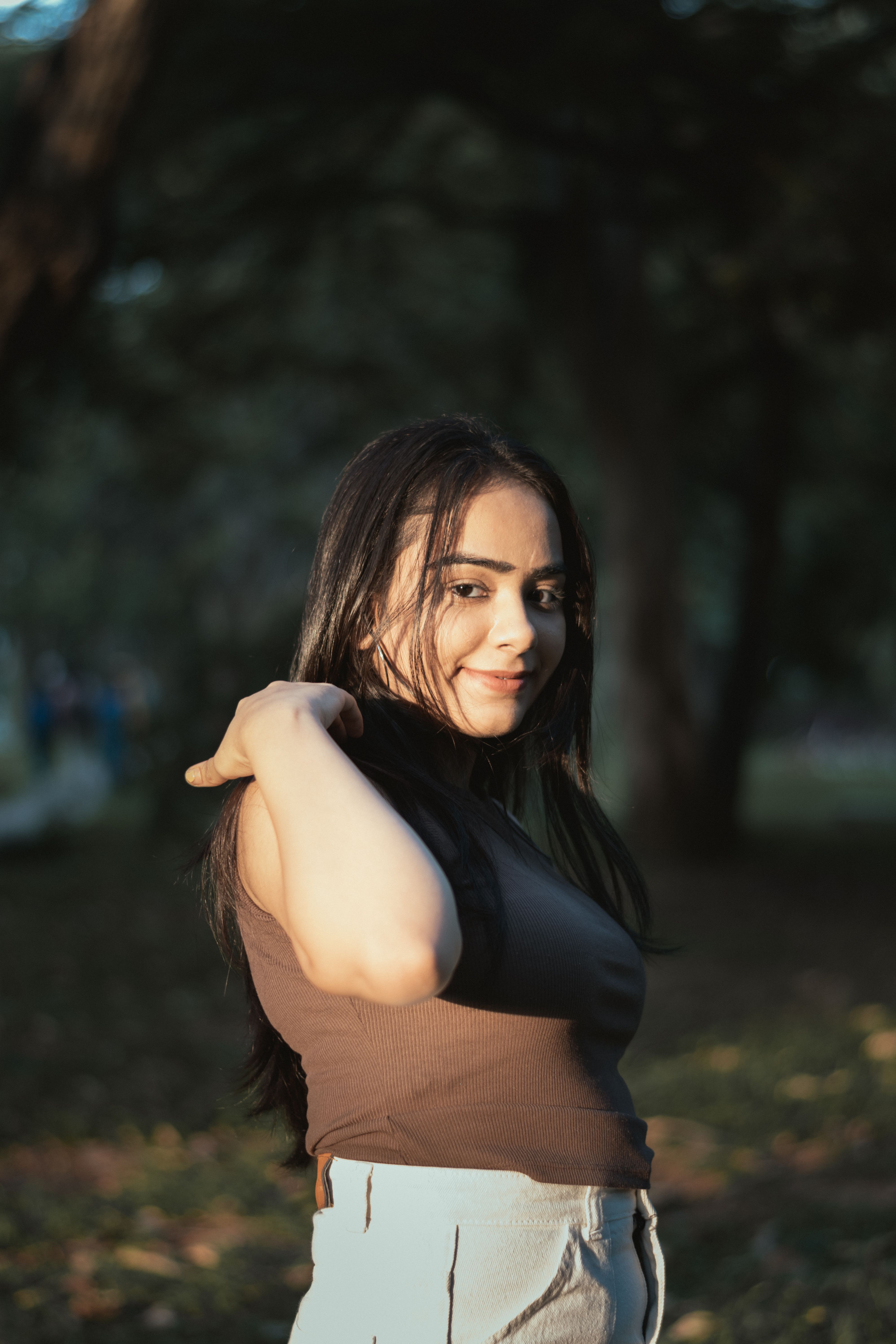 Woman Smiling in Sunlight · Free Stock Photo