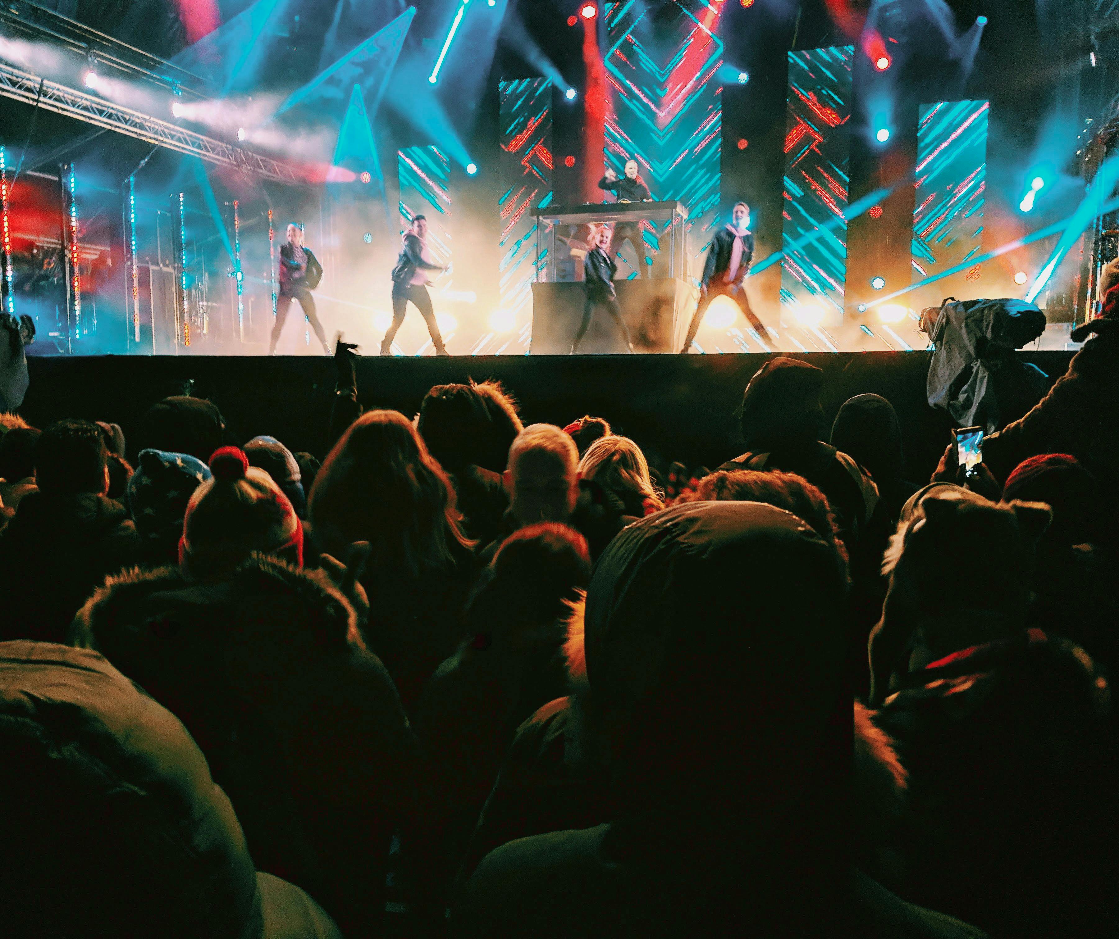 photo of people watching concert