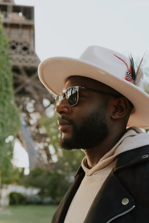 Man in Hat and Sunglasses