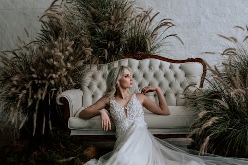 Blonde Woman Posing in Wedding Dress