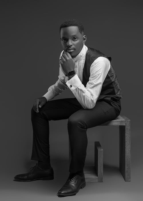 Man Posing in Suit in Black and White