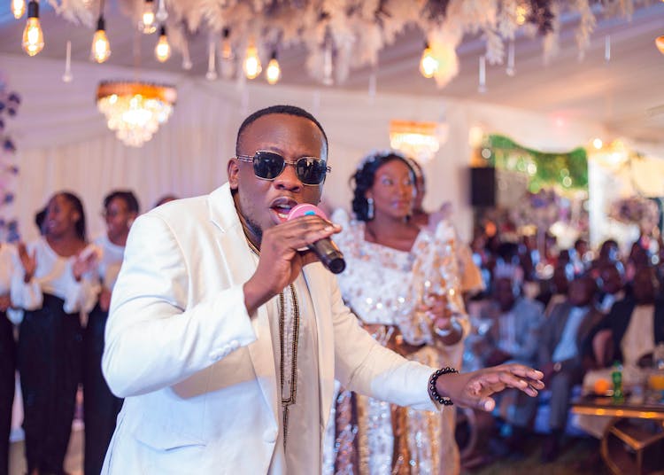 Man Singing On A Wedding Party