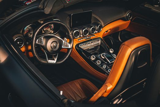 Elegant Mercedes-Benz AMG GT cockpit with premium features and luxury design.
