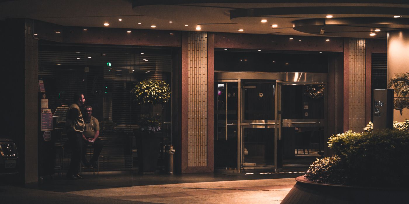 Modern hotel entrance lit at night with contemporary lighting
