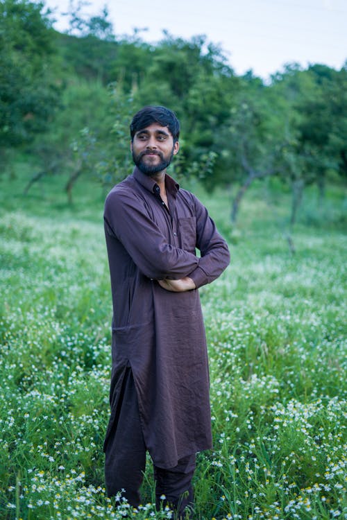 Man Standing on a Field