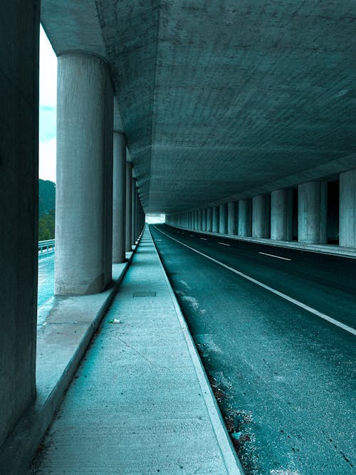 Blue Toned Image of a Concrete Tunnel in Perspective