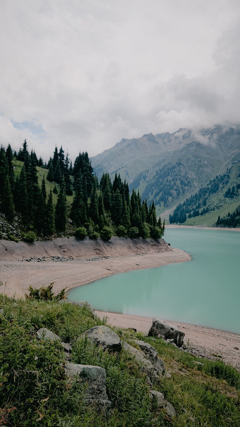 Beautiful Lake Near Snow Covered Mountain · Free Stock Photo