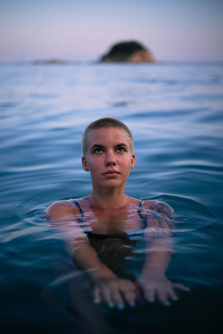 Beautiful Woman Swimming In The Sea 