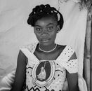 Classic black and white portrait of a woman in traditional attire showcasing cultural elegance.