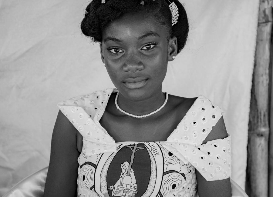 Classic black and white portrait of a woman in traditional attire showcasing cultural elegance.
