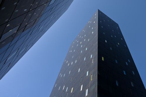 Free Low angle view of modern skyscrapers in Zagreb against a clear blue sky, capturing urban architecture. Stock Photo