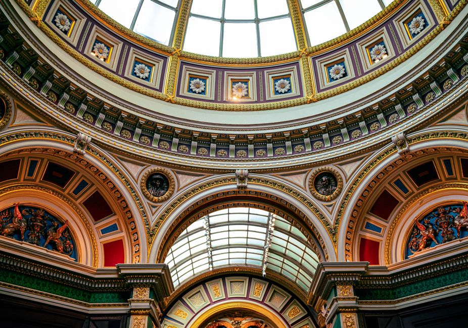 Close-up of ornate architectural ceiling inside London's National Gallery. Rich patterns and vivid colors.