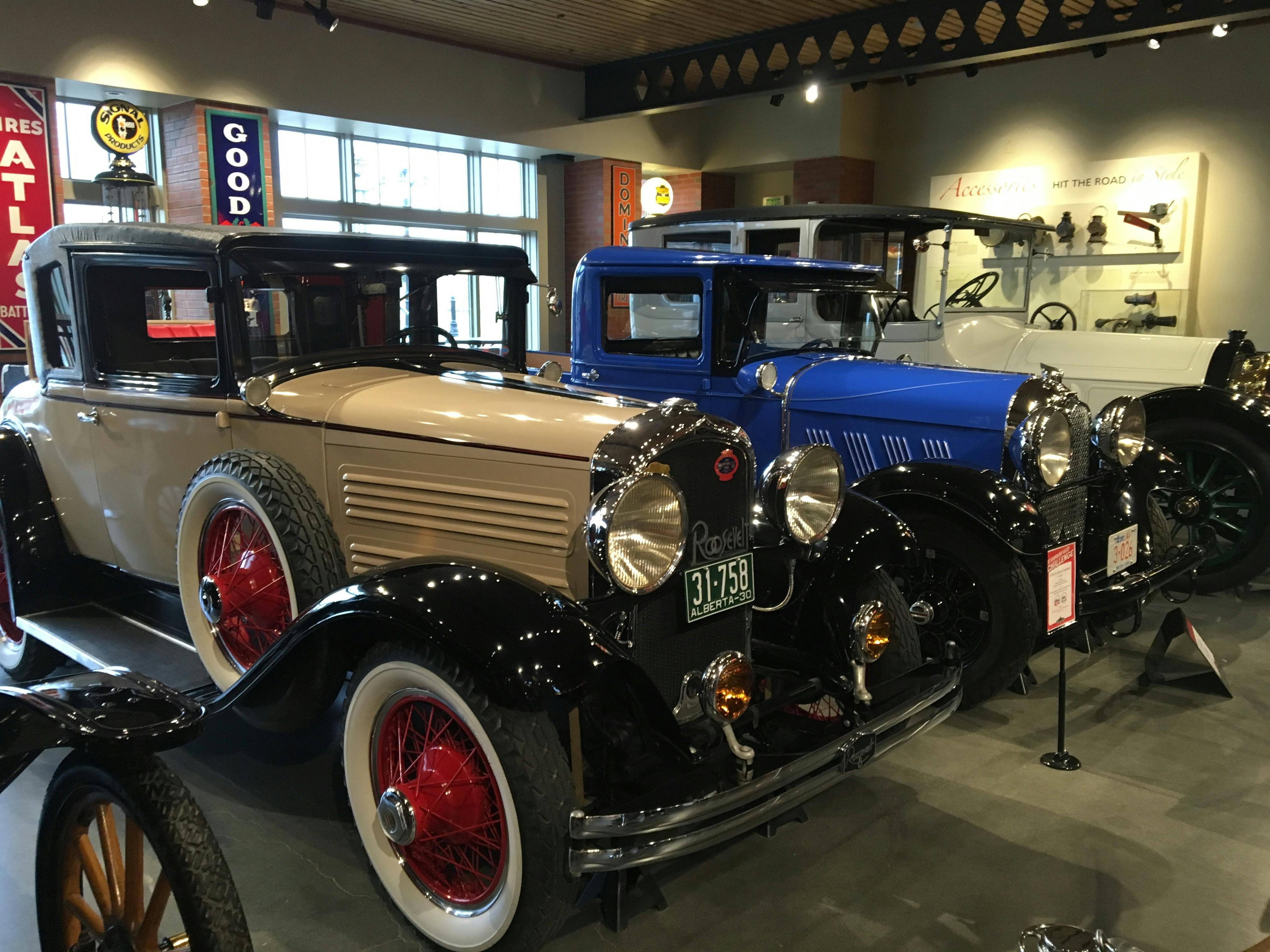 Assorted Vintage Cars in a Well Lighted Room