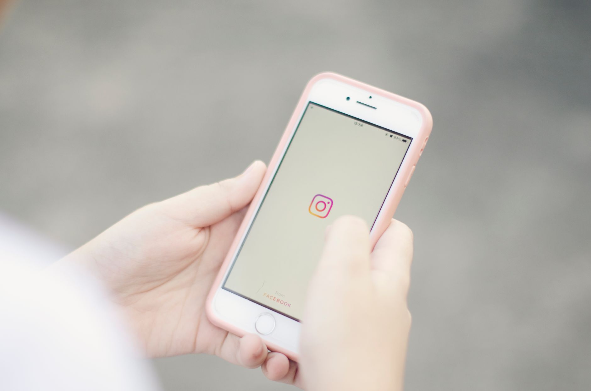 A smartphone showing an Instagram feed post at the standard Instagram carousel size of 4:5 portrait