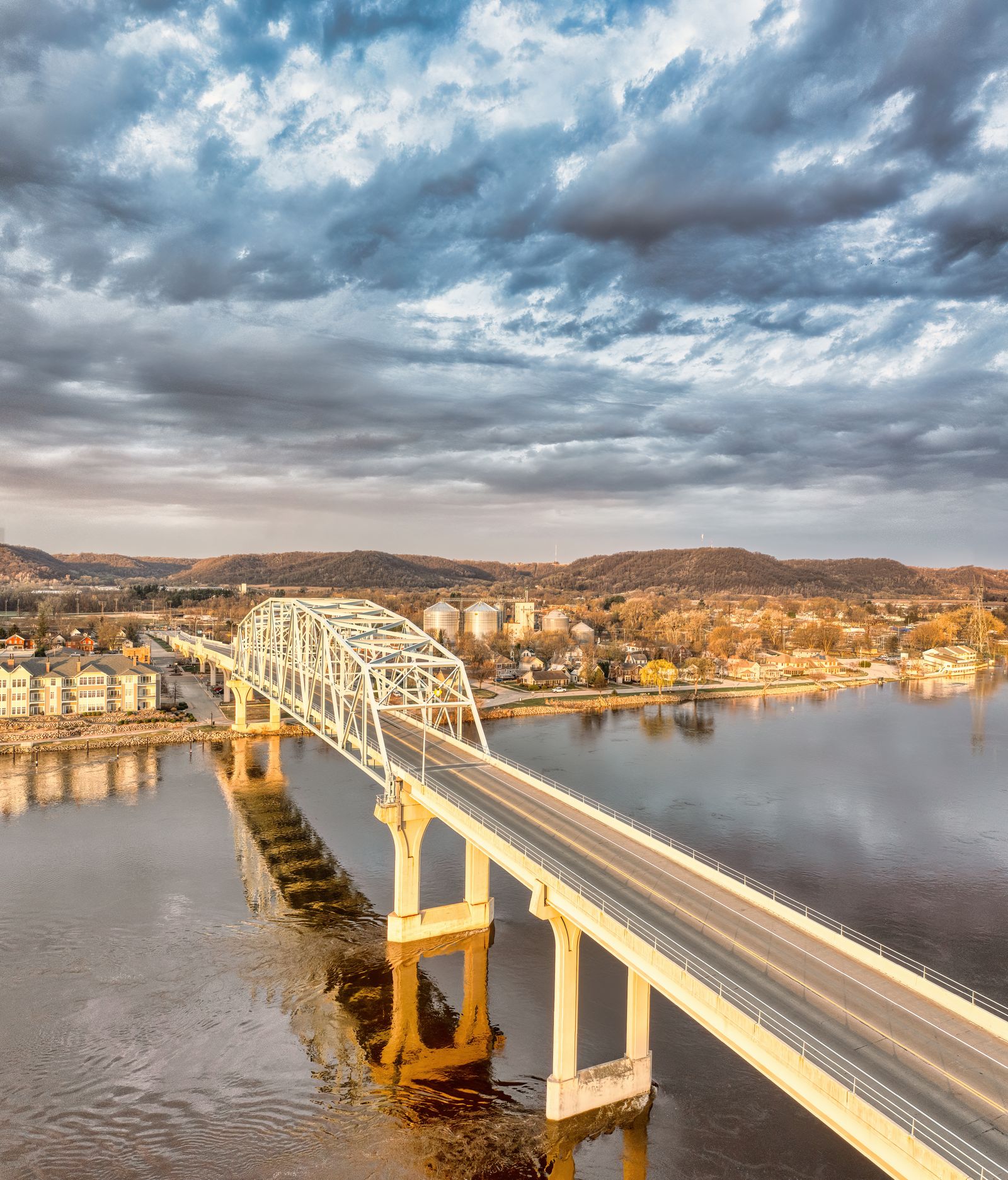 A bridge spanning the Mississippi River through a Minnesota river town