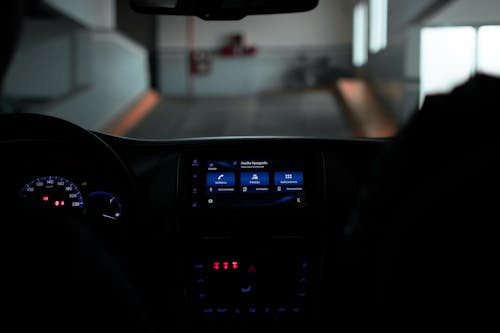 The dashboard of a car with a blue screen