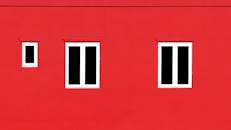 Red Building Wall with Windows