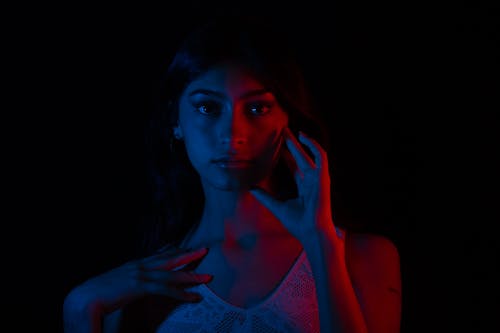 A Woman in a Dark Room