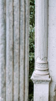 Close-up of ornamented Greek columns showcasing classical architecture details.