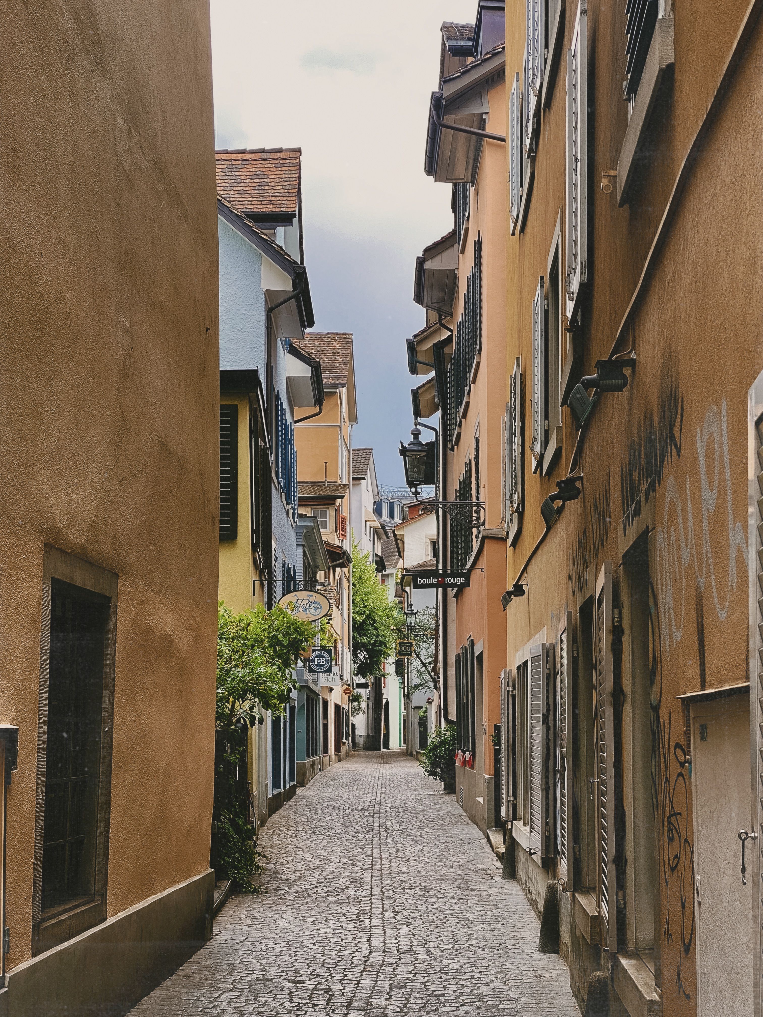 Narrow Street between Residential Buildings · Free Stock Photo