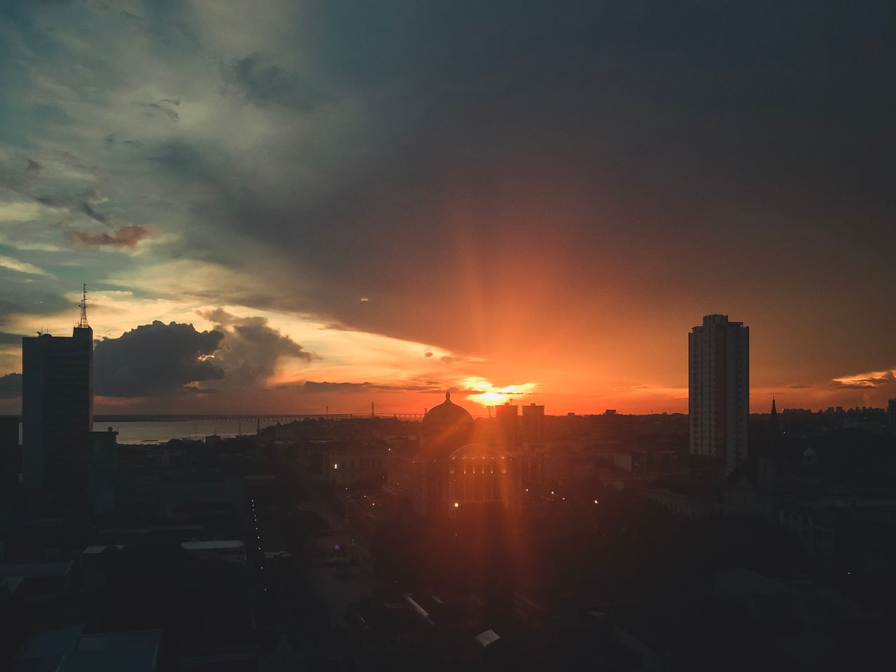 experience the breathtaking city skyline silhouetted against a vibrant