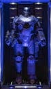 An Iron Man Costume in a Cabinet with Blue Lighting
