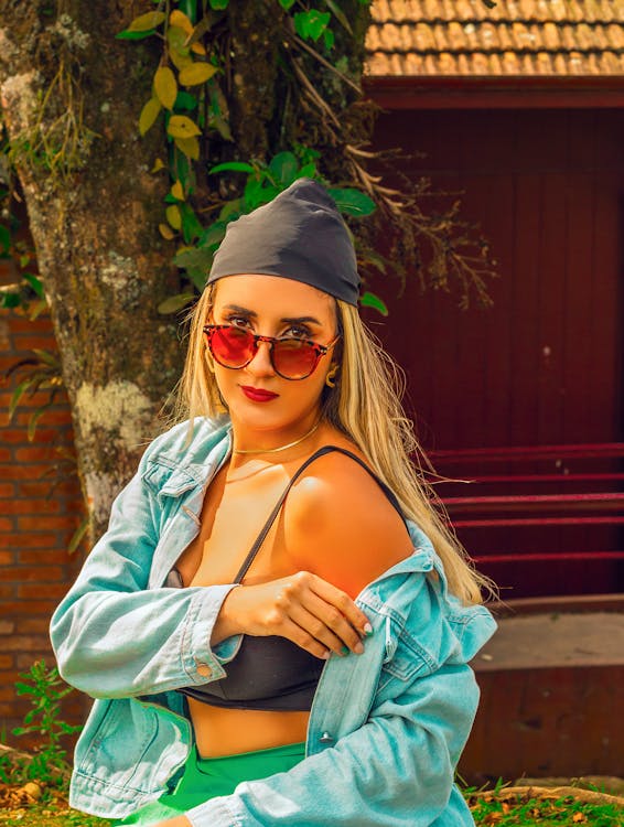 Blonde Woman in Sunglasses and Jean Jacket