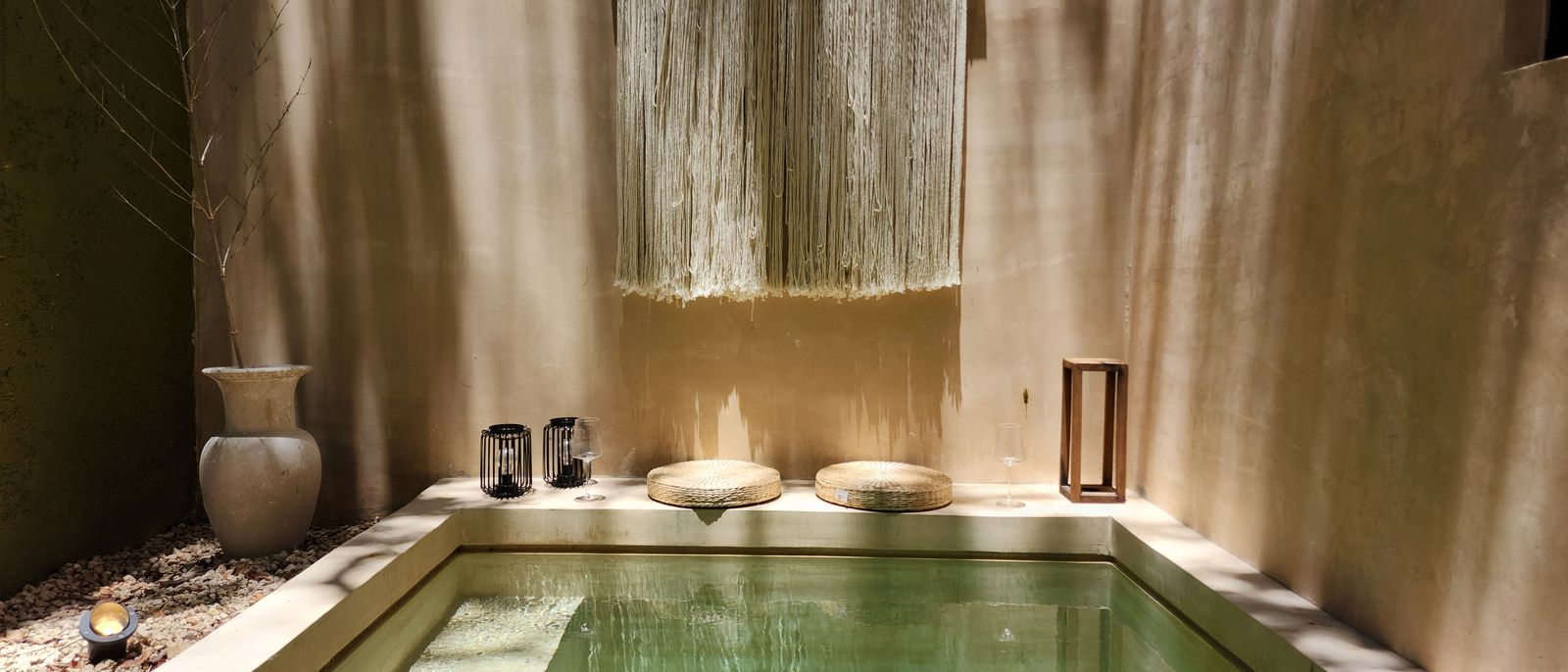 A serene indoor spa setting with natural light and minimalist decor, perfect for relaxation.