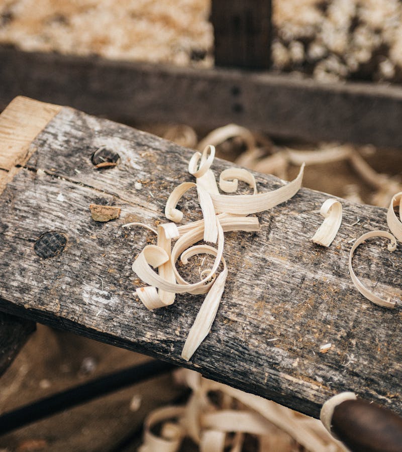 Craftsman working on wooden furniture