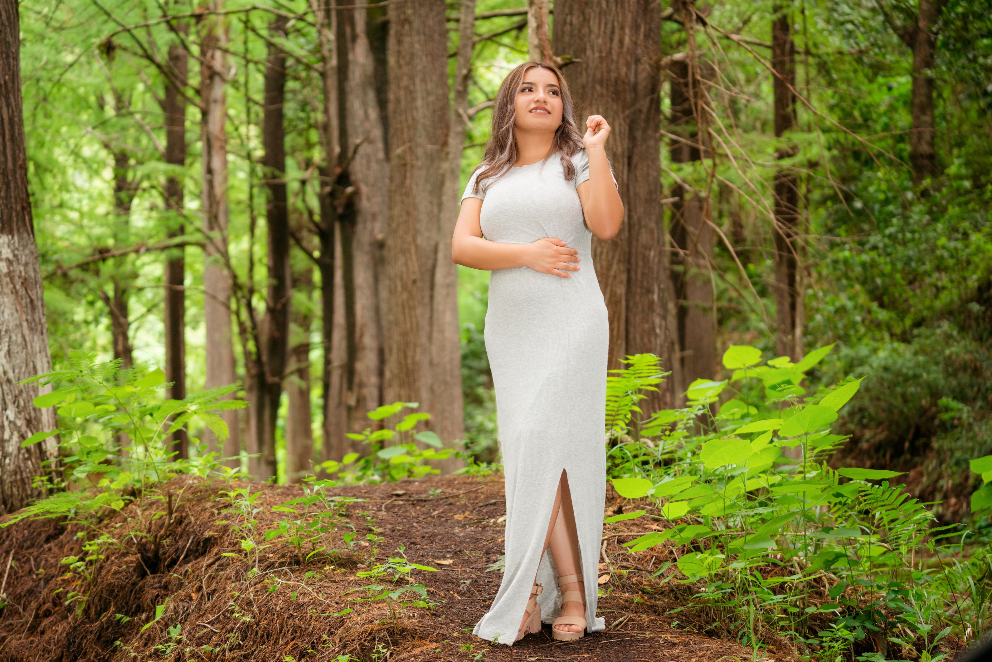 Young Woman in a Dress Posing in the Forest · Free Stock Photo