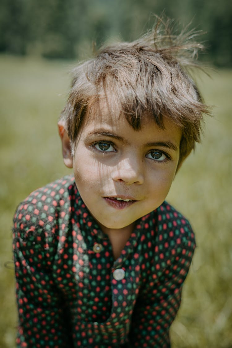 Boy Posing In Spotted Shirt