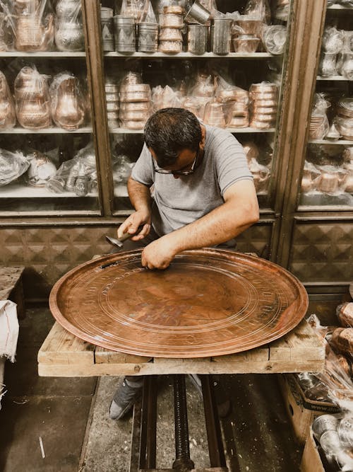 Foto profissional grátis de artesanal, artesão, cobre