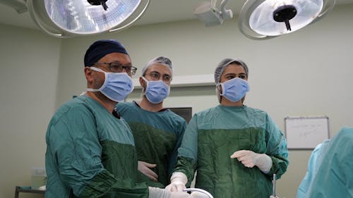 A Group of Doctors in an Operating Room 