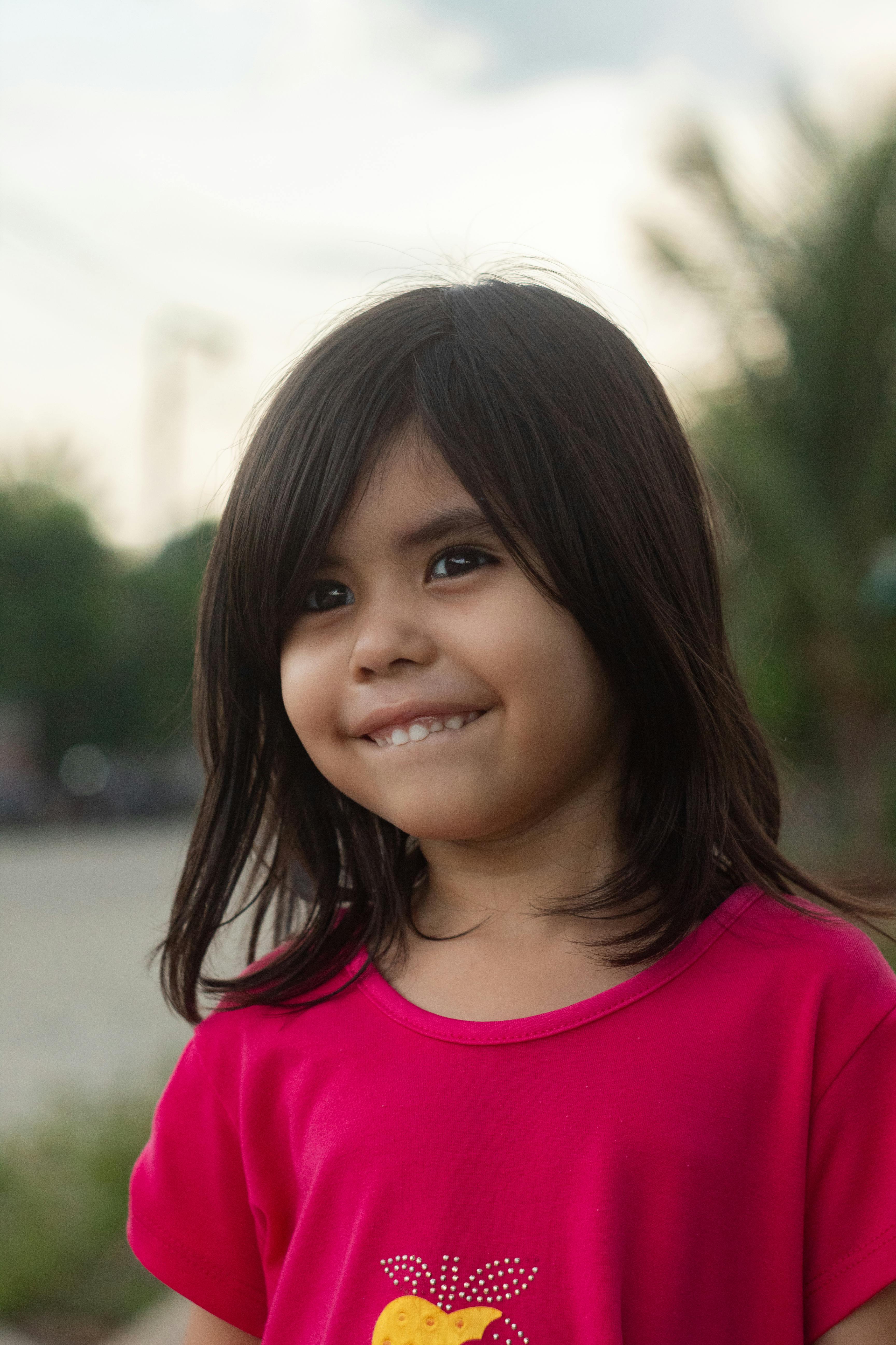 Girl Squeezing Water Bottle · Free Stock Photo
