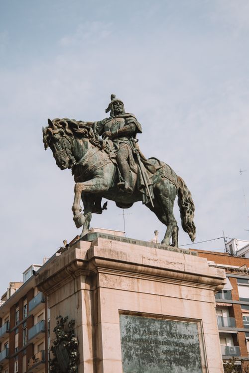 Free Bronze equestrian statue of King Jaume I, landmark in Valencia, Spain against urban backdrop. Stock Photo