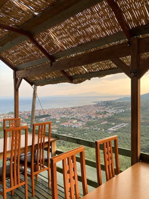 Terrace of a Restaurant with the View of the Coastline and City 