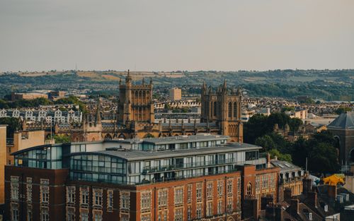 Free Scenic view of a historic cathedral amidst modern urban architecture in a vibrant city. Stock Photo