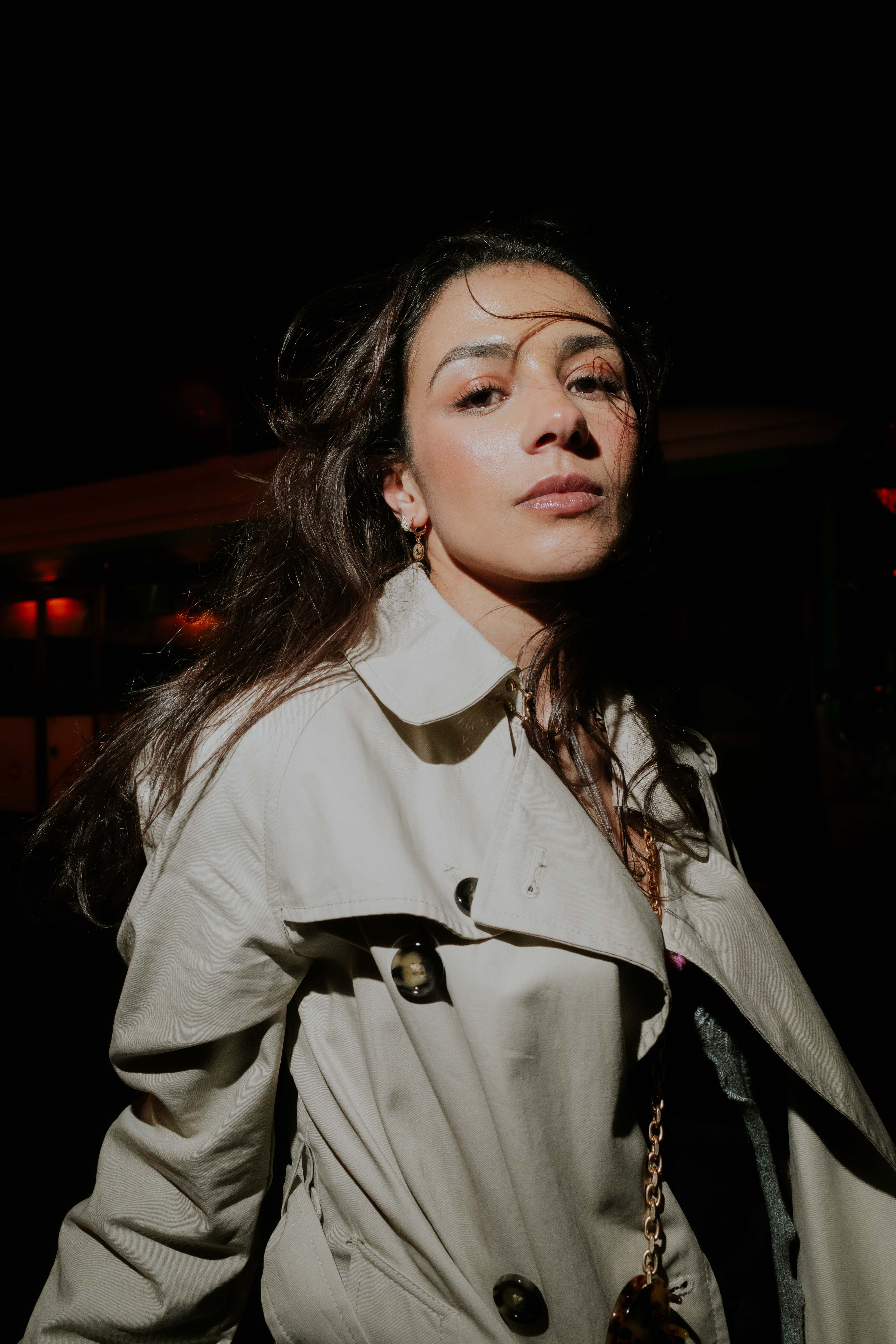Young Brunette Woman in Black PVC Matrix Style Trench Coat Posing at a ...