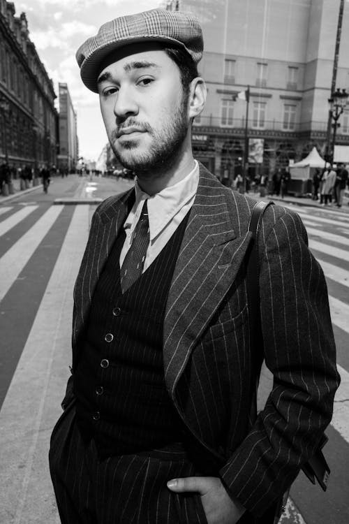 Man in Vintage Clothing on Zebra Crosswalk