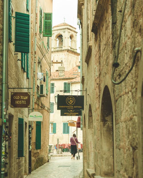 A Narrow Alley between Historical Buildings in Old Town of Kotor, Montenegro