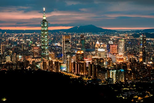 Illuminated City at Sunset