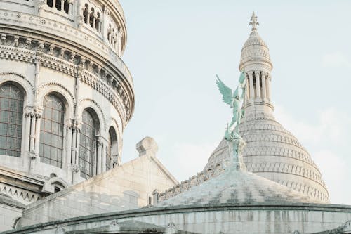 Statue on Church Rooftop