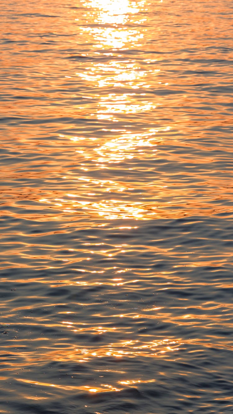 Sunset Reflecting In Sea Water