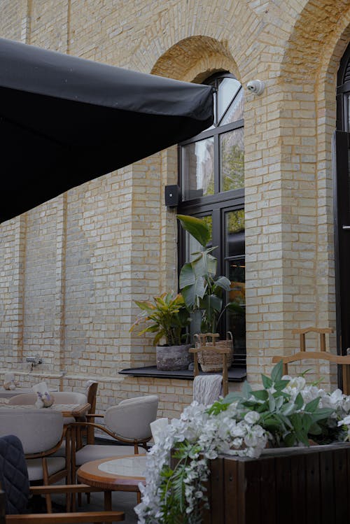 レストラン, 垂直ショット, 屋外テーブルの無料の写真素材