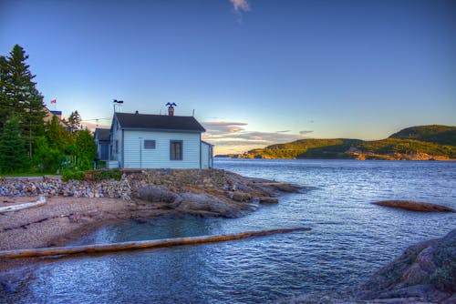 White House Beside Body of Water